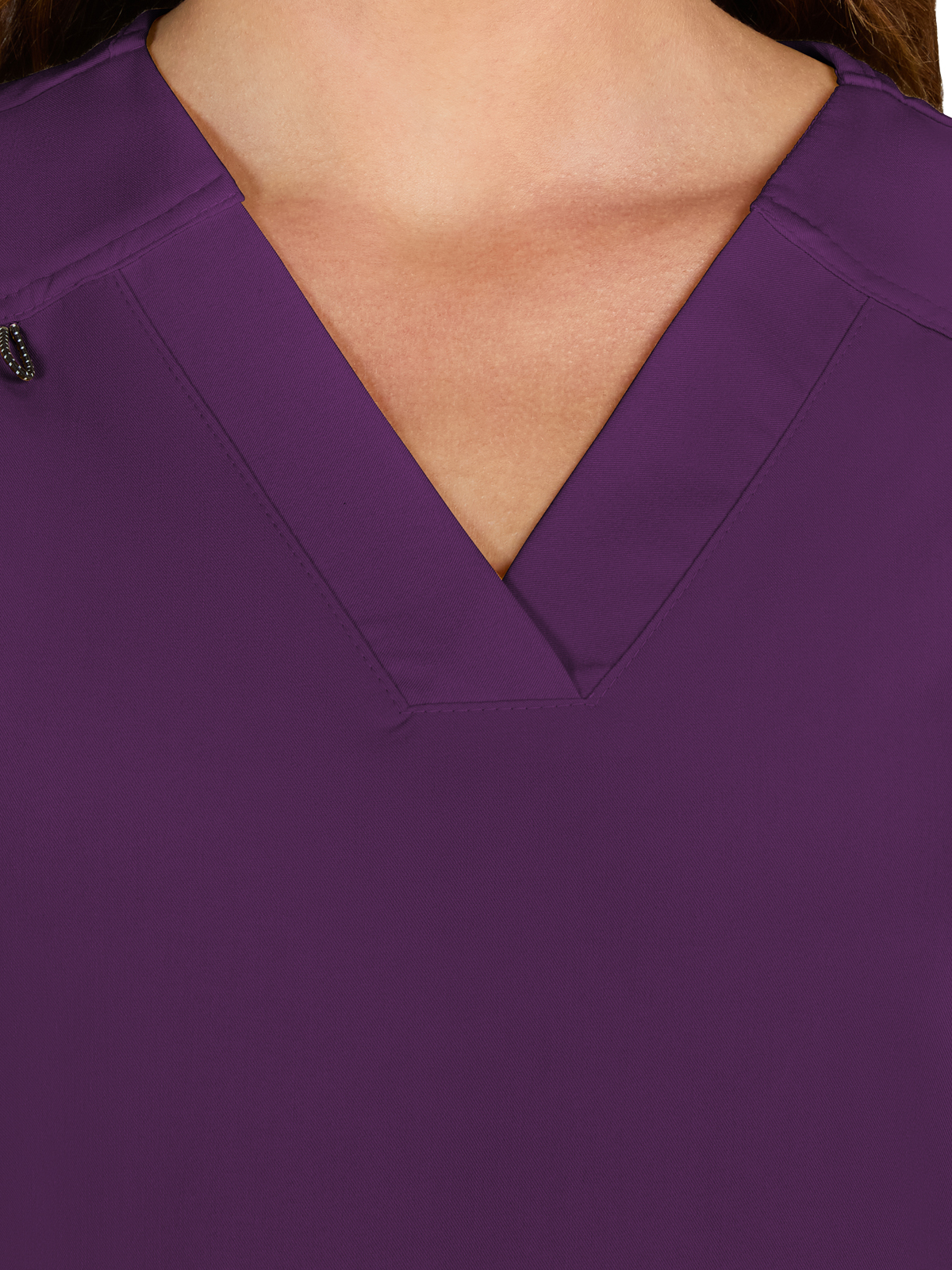 koi - Next Gen - Women's Three-Pocket Wide V-Neck Stretch Hustle and Heart Top 27