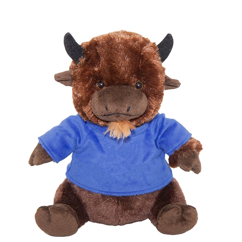 A stuffed cow in a T-shirt 4