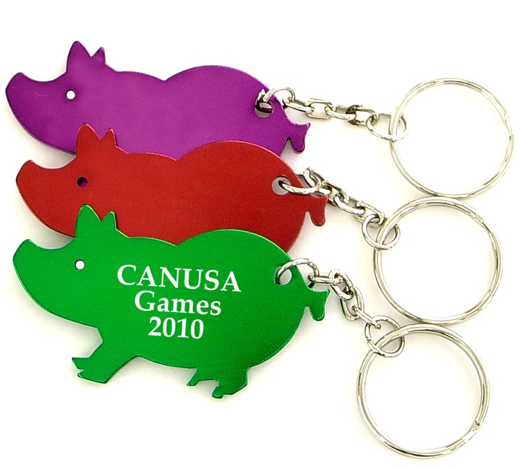 Pig shape bottle opener with key chain.