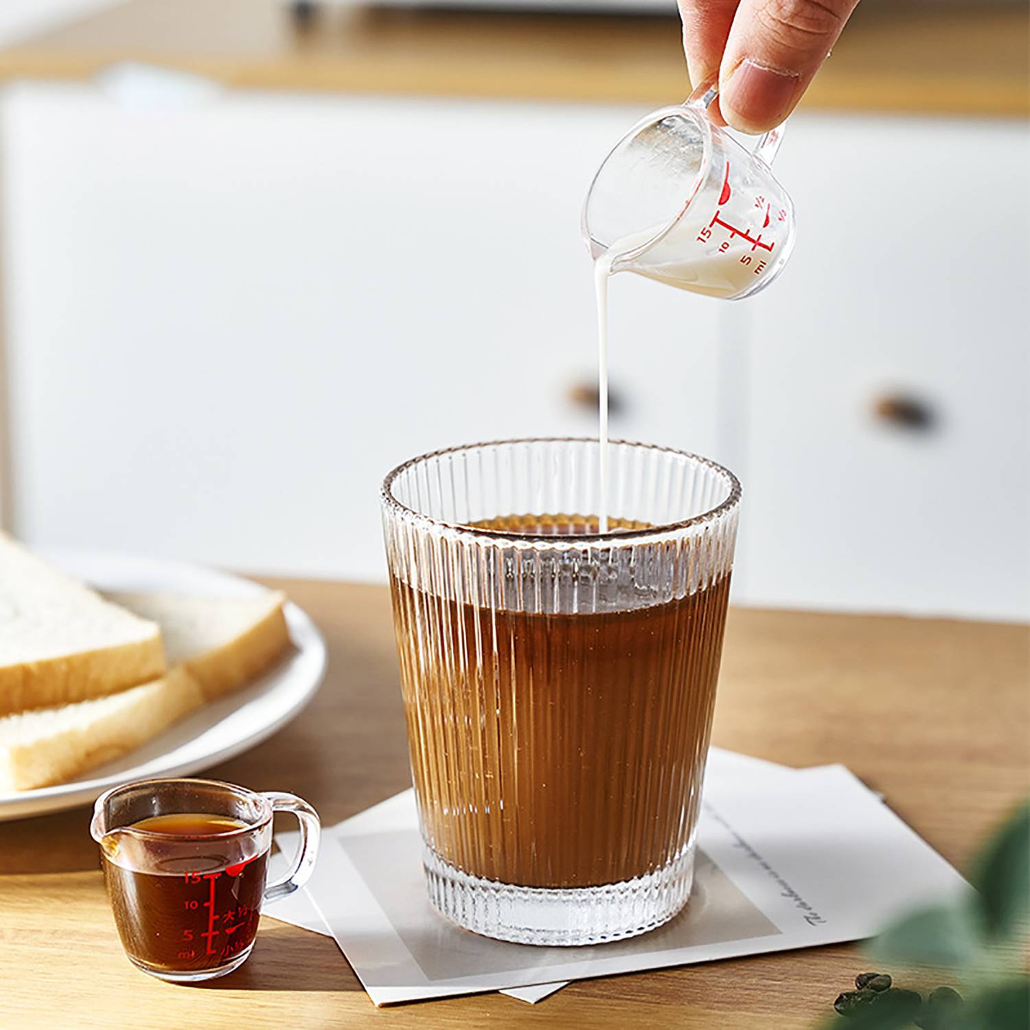 0.5oz Mini Clear Measuring Cup 1