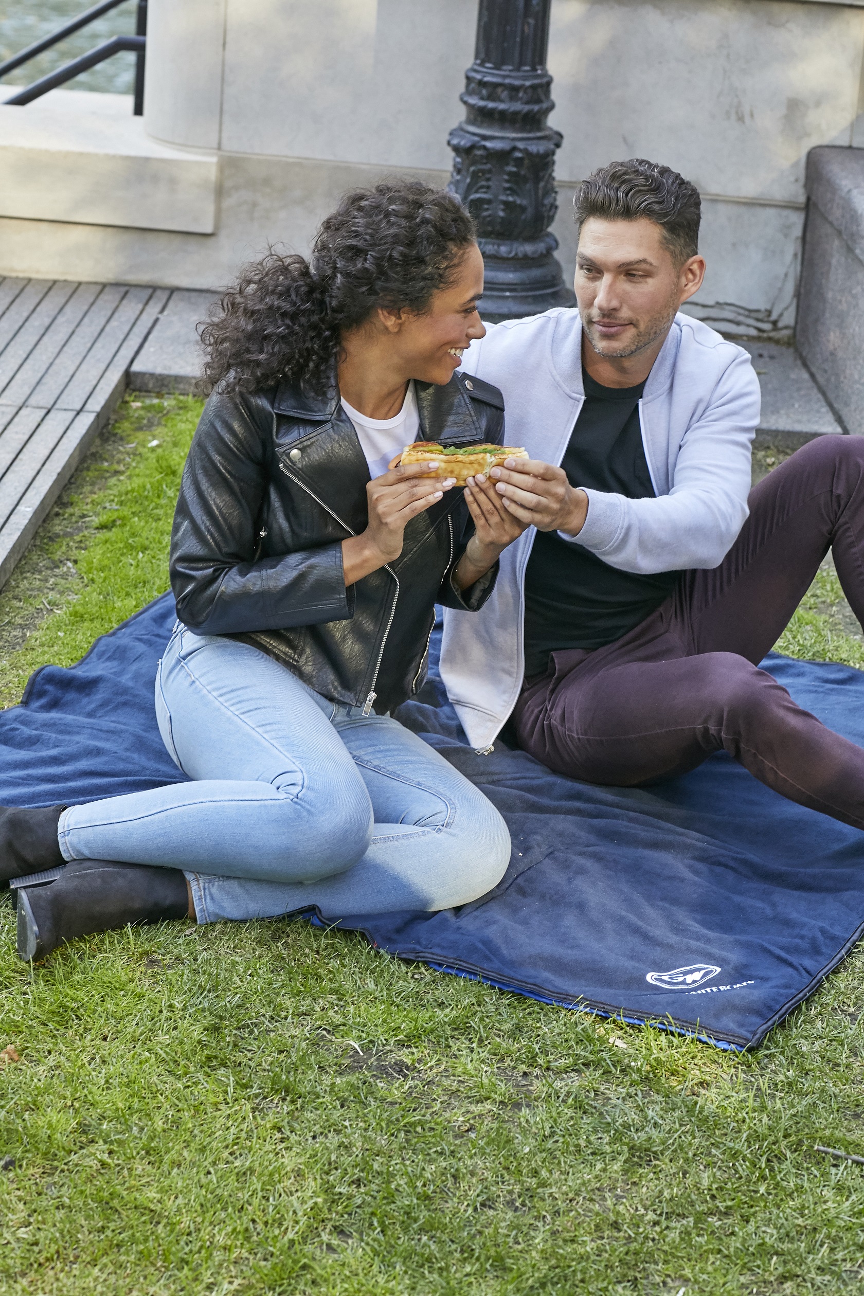 4-in-1 Blanket/Poncho/Seat Cushion/Backpack (TM)