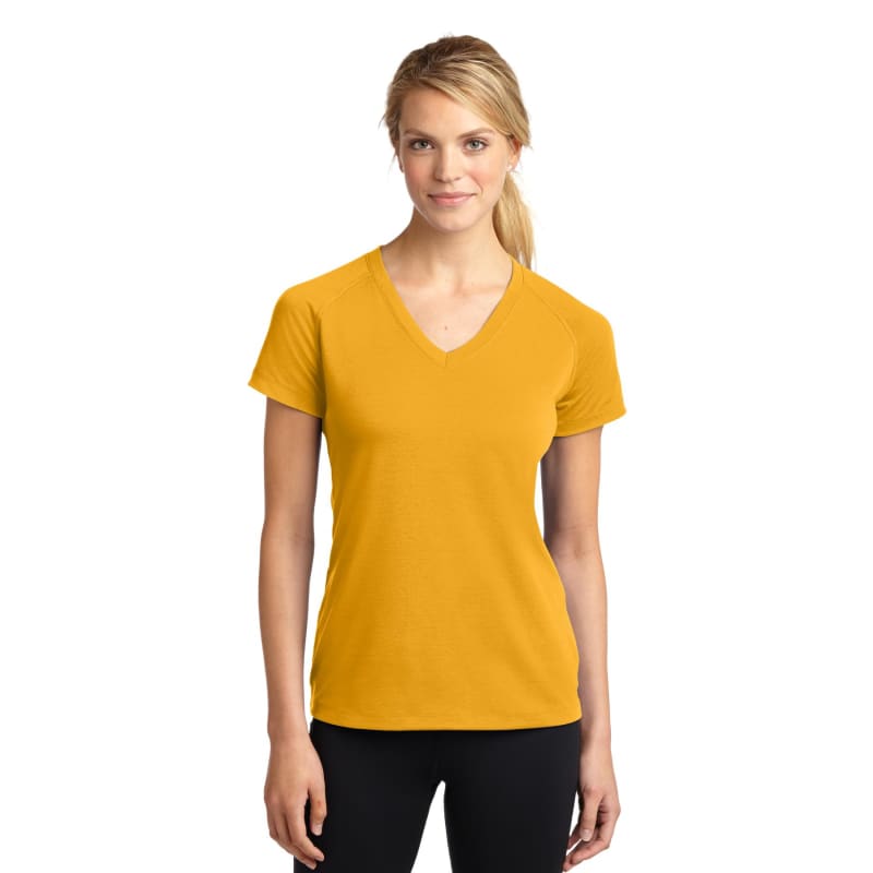 Sport-Tek Women's Ultimate Performance V-Neck. 1