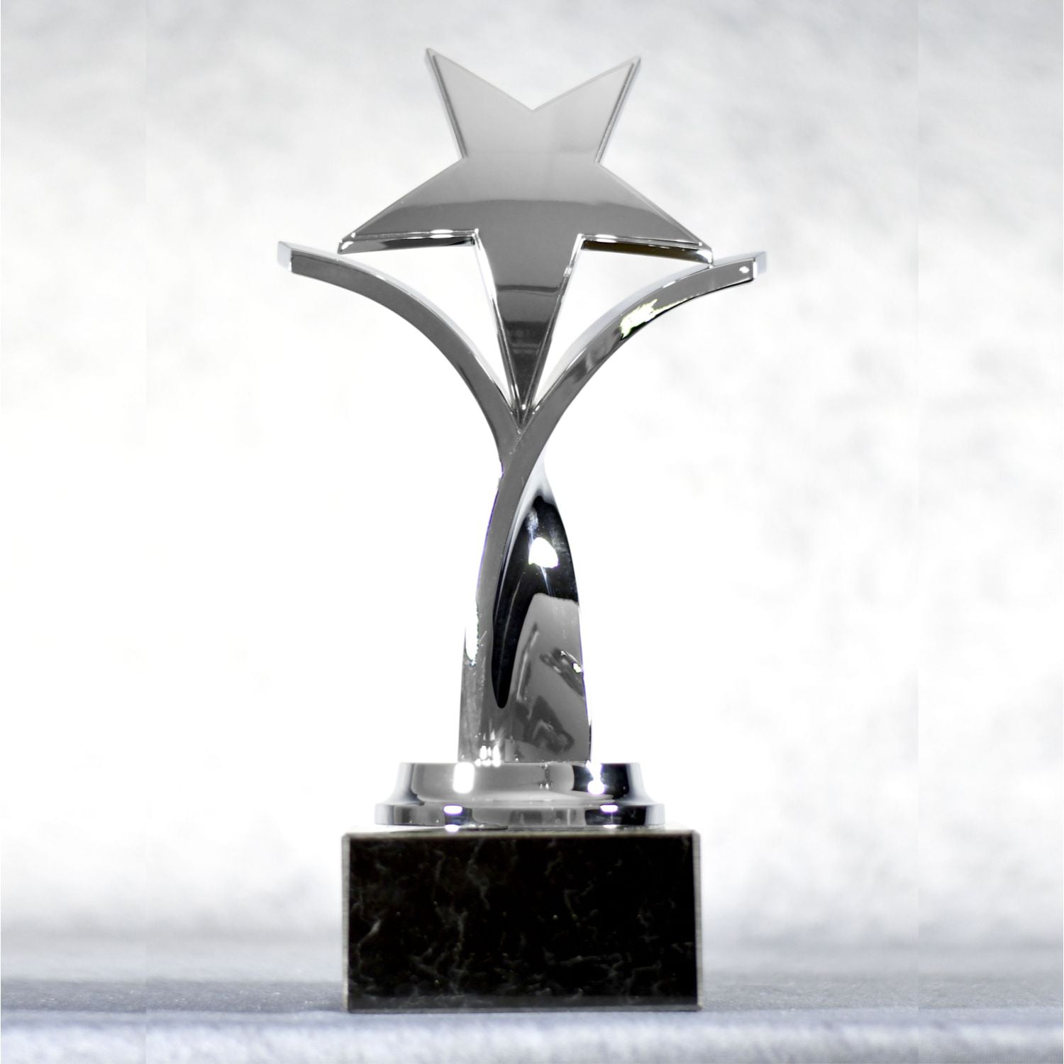 Twisting Star On Black Marble Base 5