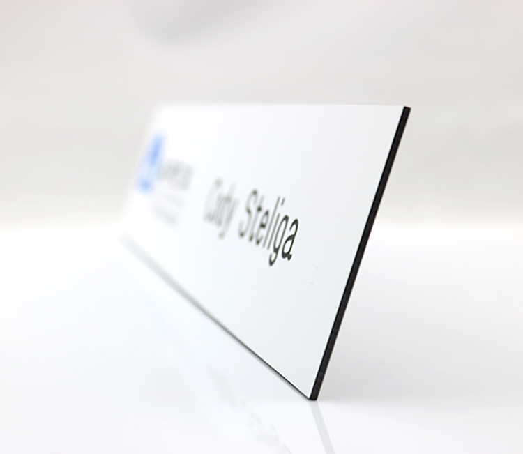 The Olympic UV Printed and engraved name plate on 2-plyplastic 2"x8" 4