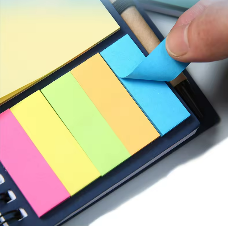 Notebook with sticky notes and pen 1