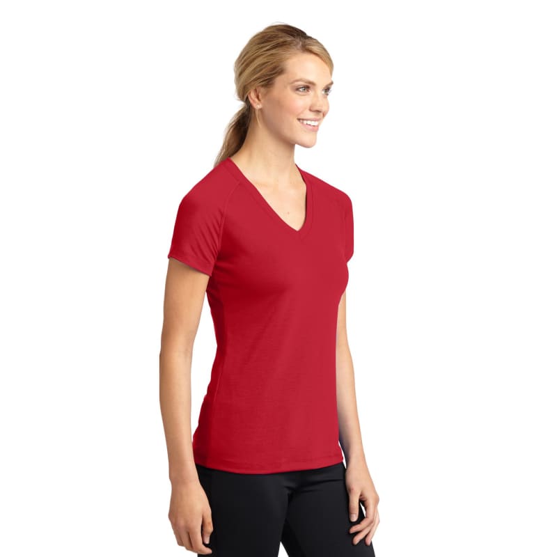 Sport-Tek Women's Ultimate Performance V-Neck. 23