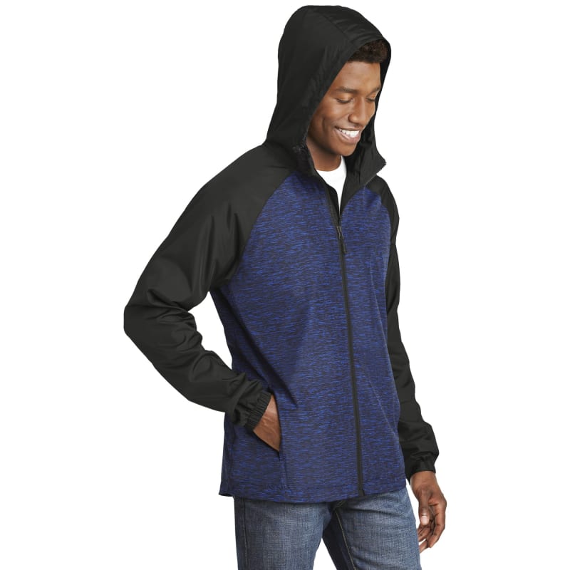 Sport-Tek Heather Colorblock Raglan Hooded Wind Jacket. 23