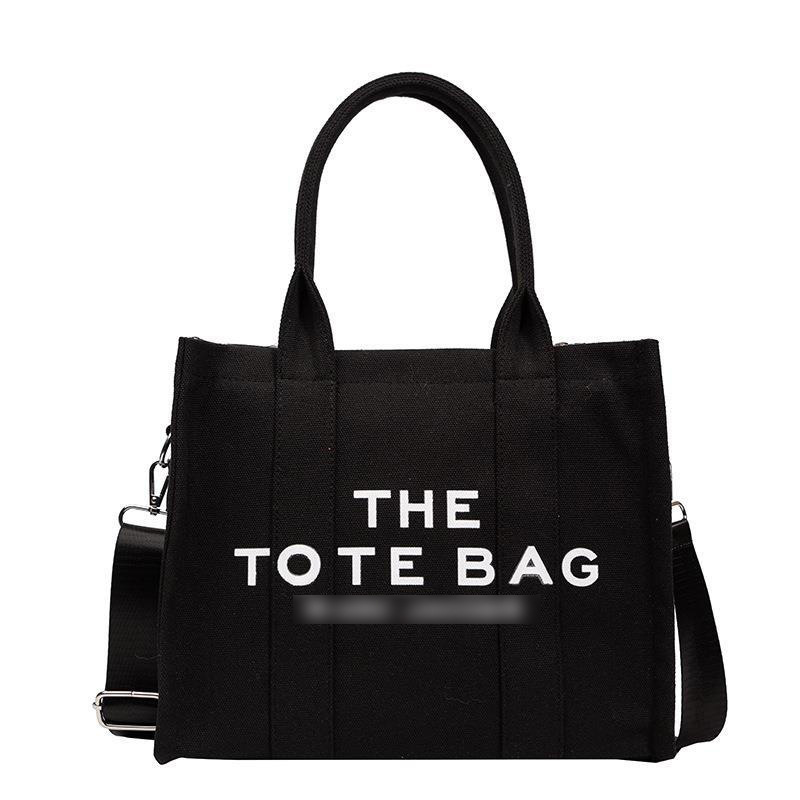 Women's New Fashion Canvas Large Capacity Handbag Single Shoulder Bag Makeup Bag 2