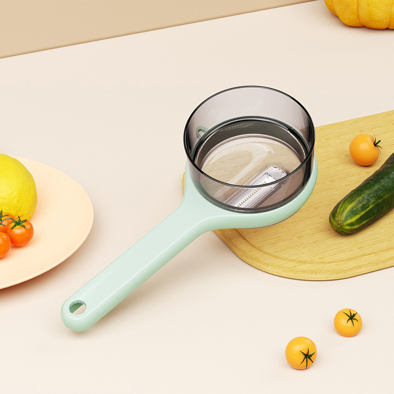 Vegetable Peeler with Built-in Container 2