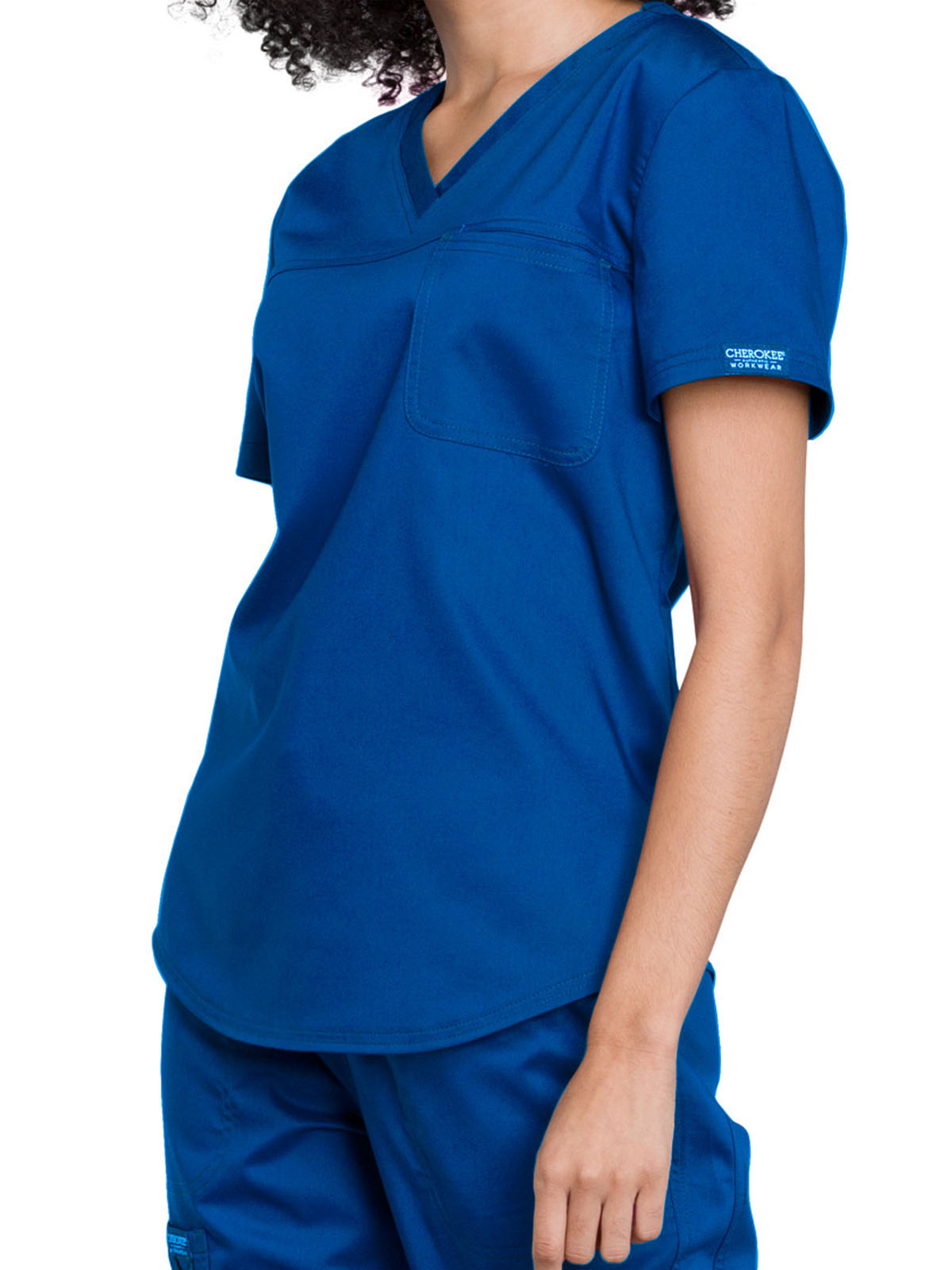 Cherokee - Workwear Revolution - Women's 1-Pocket Tuckable V-Neck O.R. Top 15