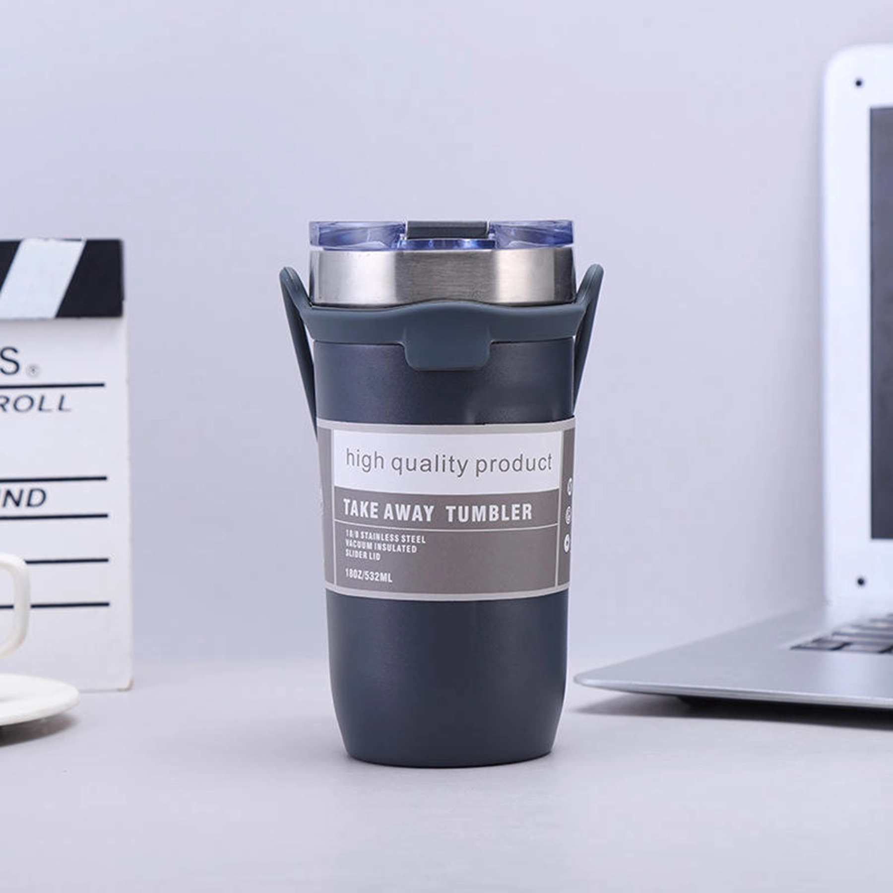 19  Oz. Vacuum Insulated Coffee Tumbler with Silicone Strap 1