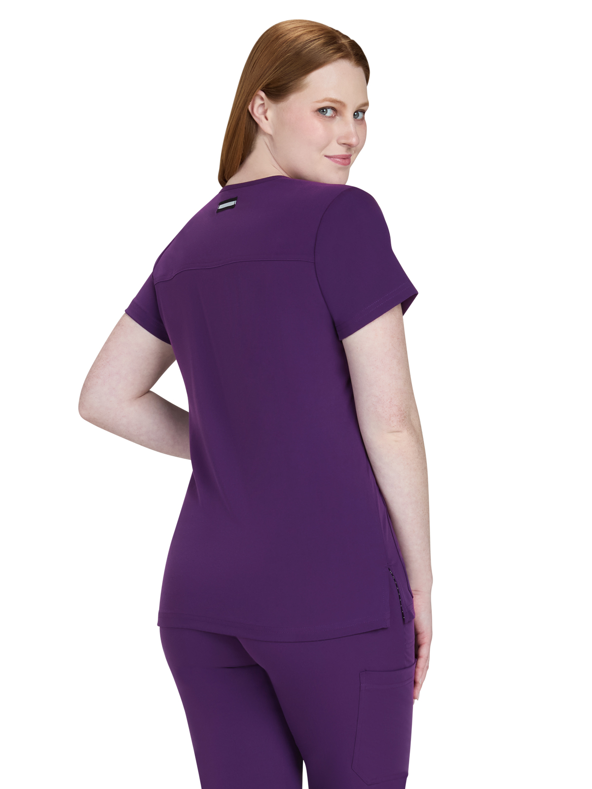 koi - Next Gen - Women's Three-Pocket Wide V-Neck Stretch Hustle and Heart Top 1