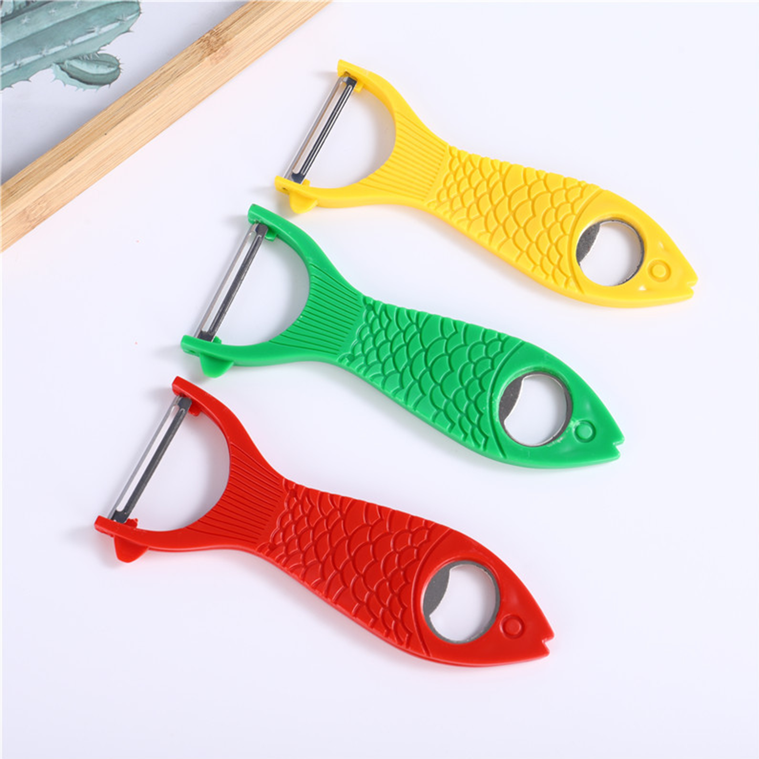 Multifunctional Fish Peeler And Bottle Opener 2