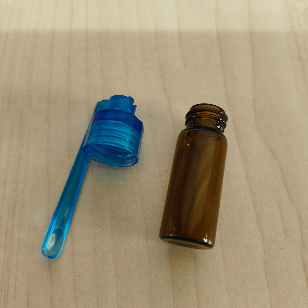 Glass Bottle Pill Box With Spoon 1