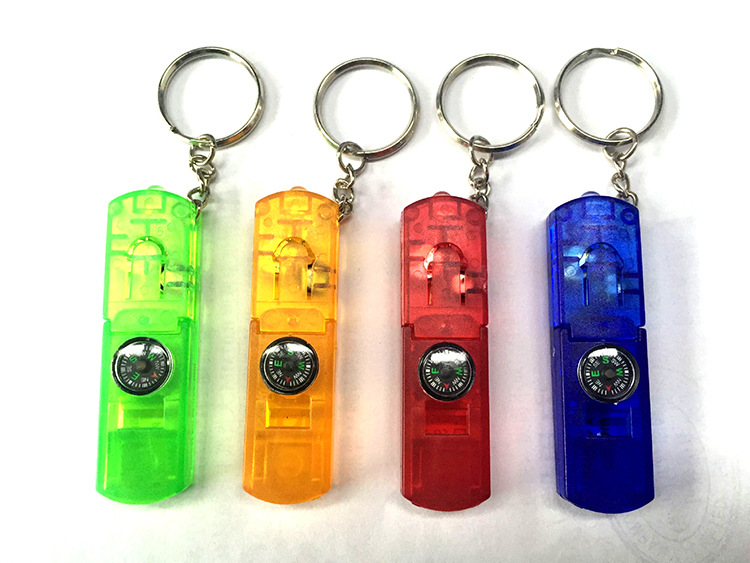 Whistle key chain with LED light with compass. 1