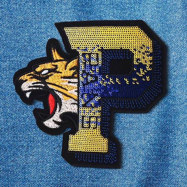 Embroidery + Sequin Patches, custom branded apparel with logo imprint 2