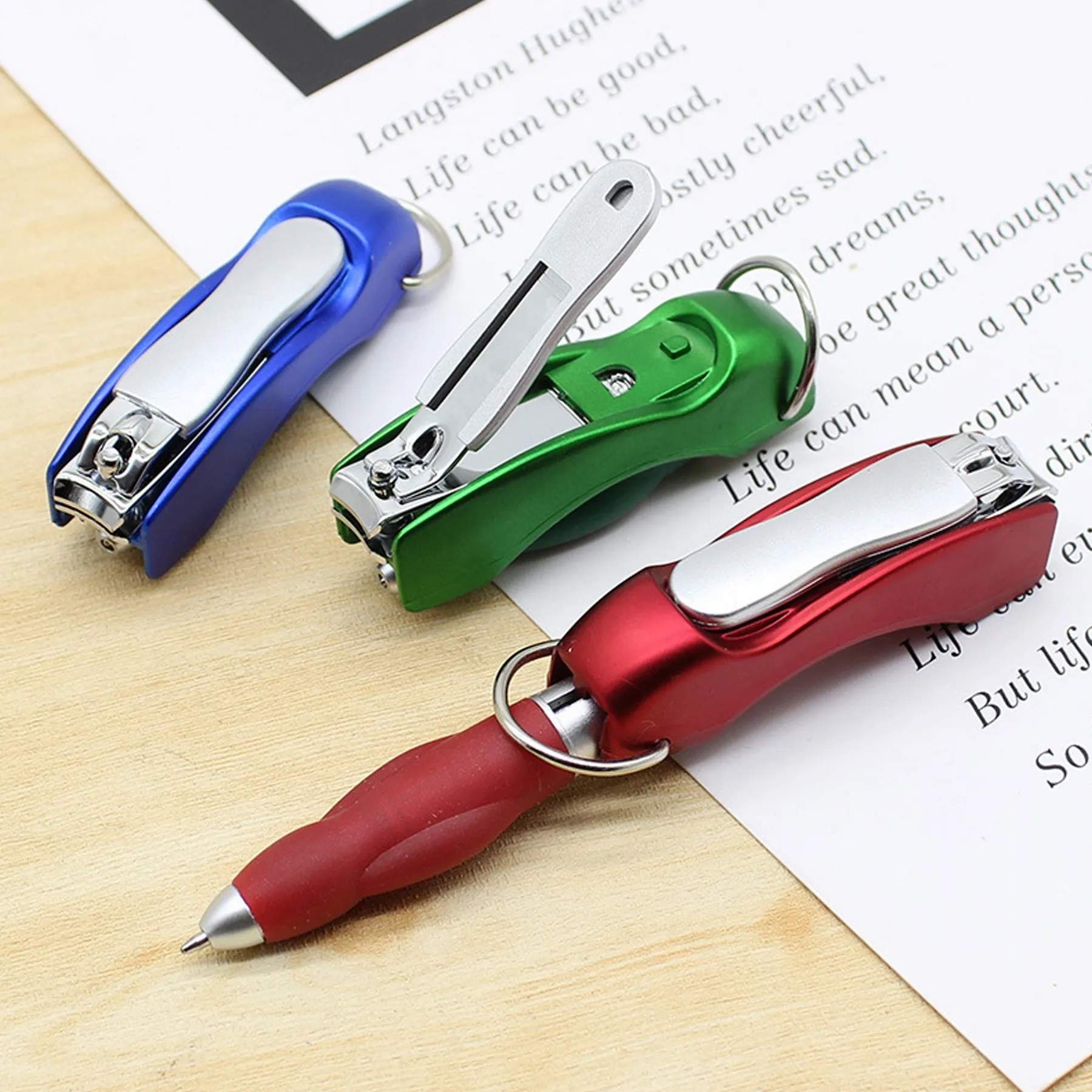 Folding Ballpoint Pen With Nail Clipper 1