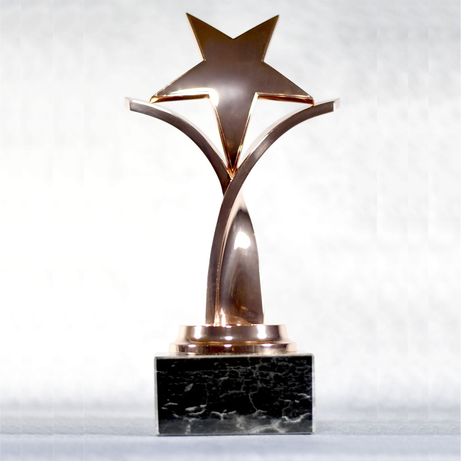 Twisting Star On Black Marble Base 3