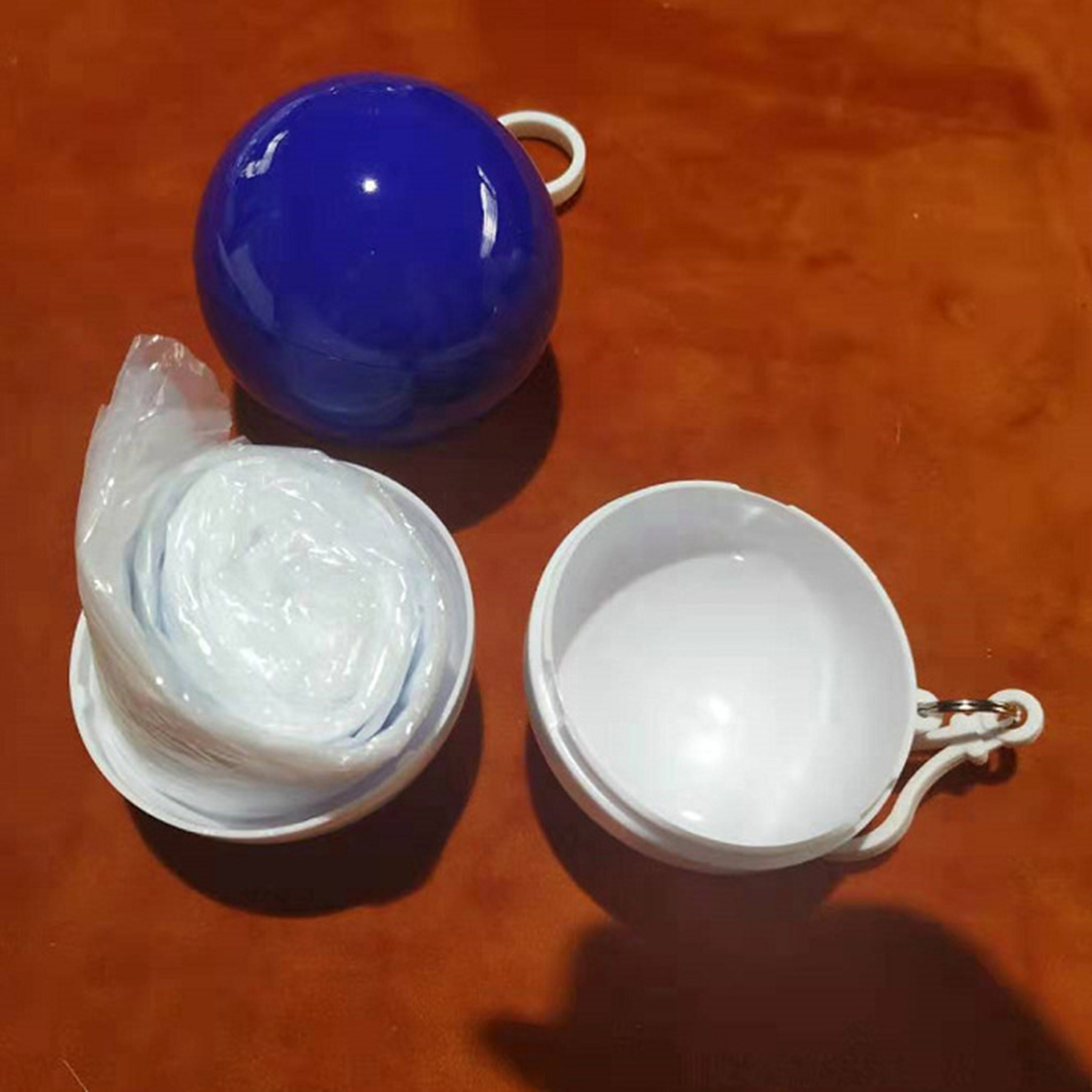 Disposable Raincoat Ball with Keychain 3