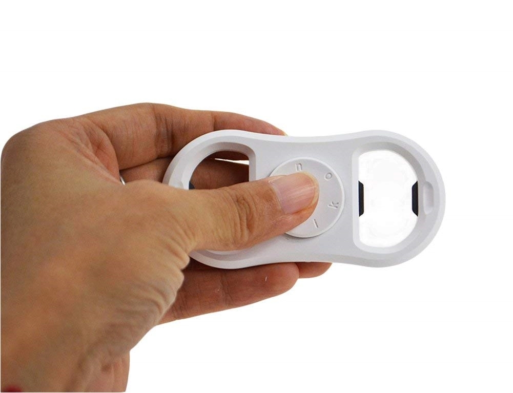 Bottle Opener with Spinner Over Fingers 4