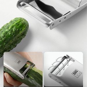 2 IN 1 Stainless Steel Fruit & Vegetable Peeler with Ring Holding Design 1