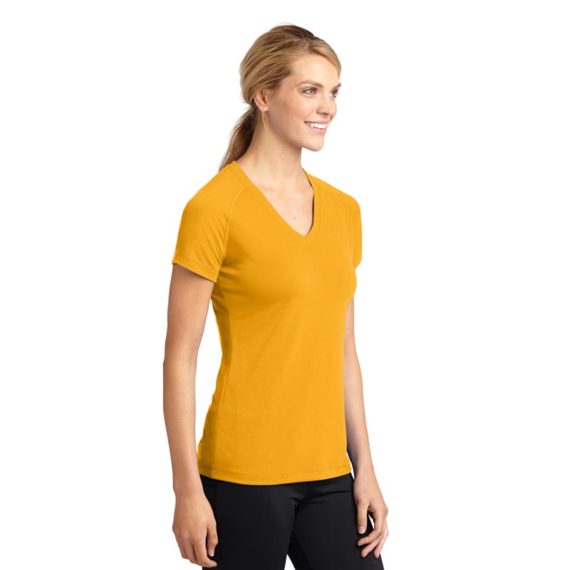Sport-Tek Women's Ultimate Performance V-Neck. 16