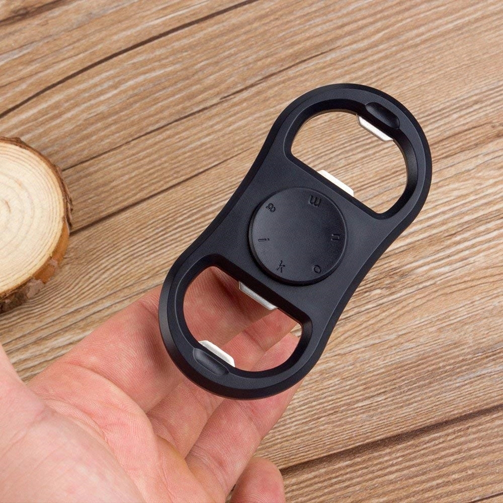 Bottle Opener with Spinner Over Fingers 9