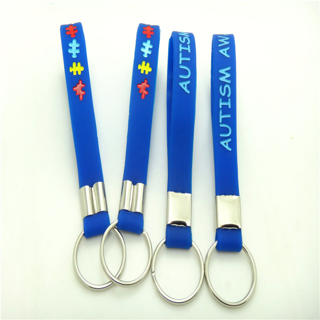 1/2 Inch Wide Deboss-Fill Silicone Wristband Keychain 1