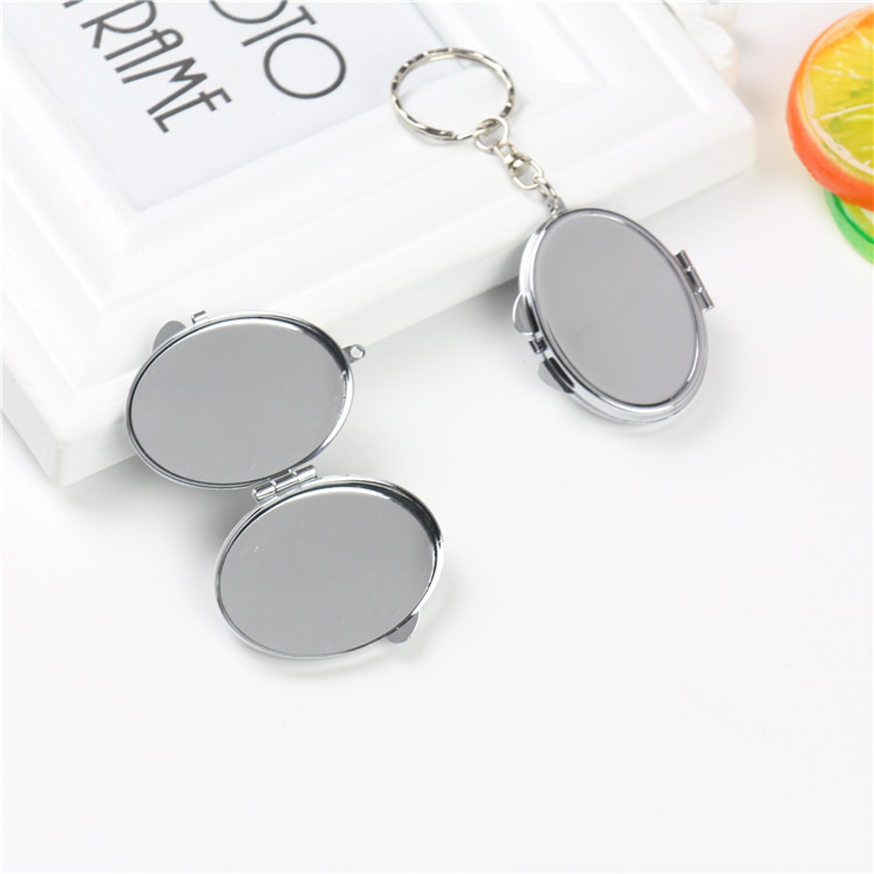 Oval Foldable Mirror Key Pendant 2