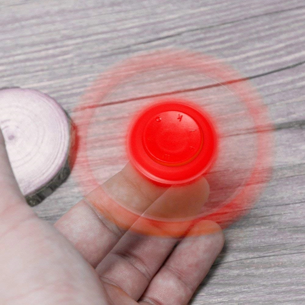 Bottle Opener with Spinner Over Fingers 8
