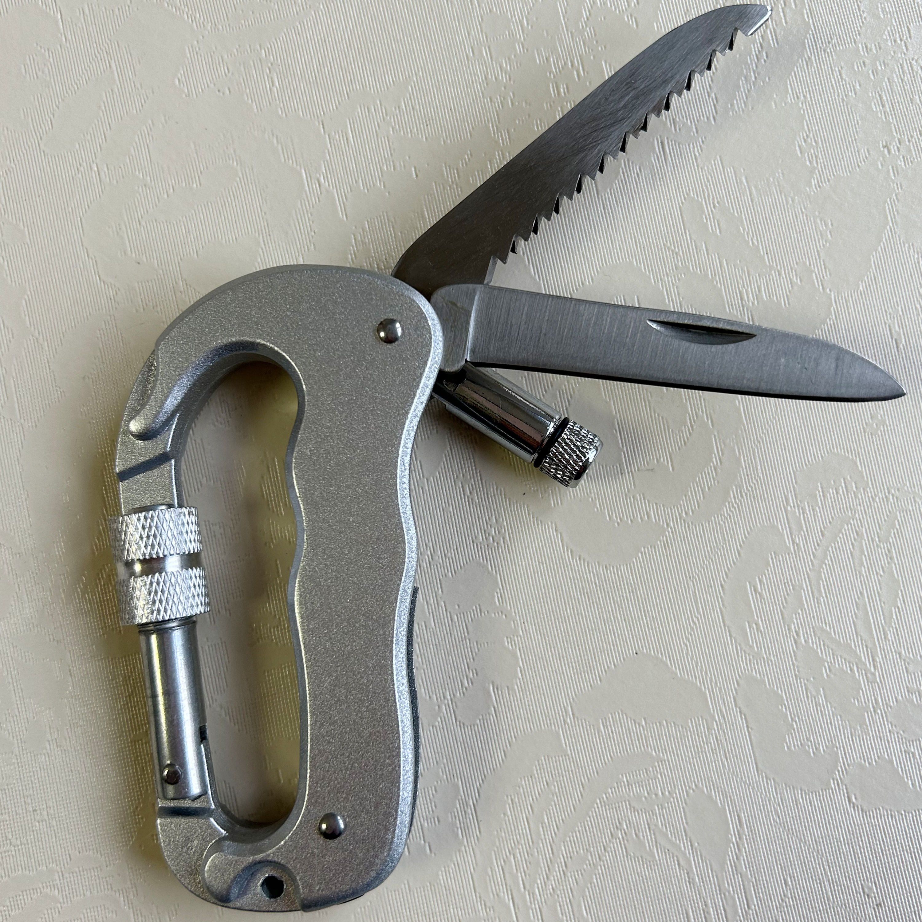 Multifunctional Carabiner Key Chain with Knife Saw and LED Light 3