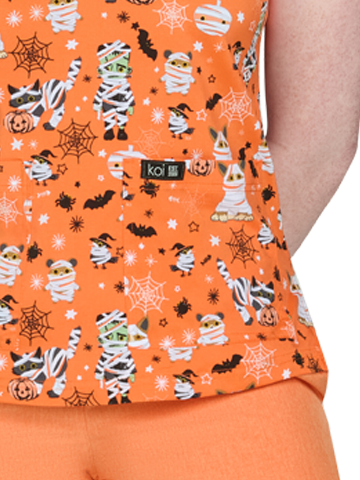 koi - Basics - Women's Two-Pocket Athletic-Inspired, Breathable Mesh Leslie Top 1