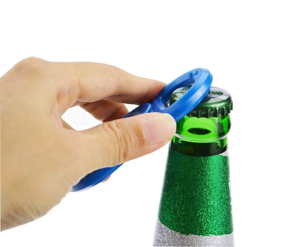 Bottle Opener with Spinner Over Fingers 10