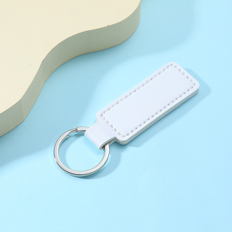 9/10 inches wide and 2 4/5 inches long Key chain 2