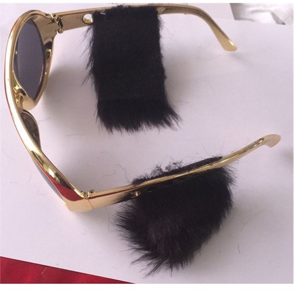 Sunglass with Elvis sideburns 2