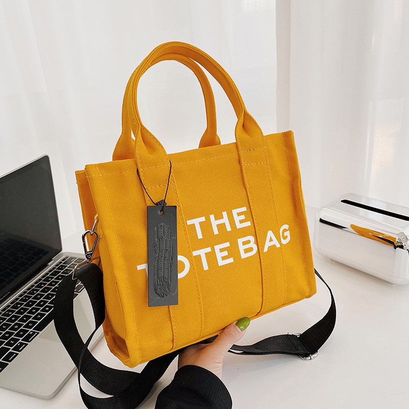 Women's New Fashion Canvas Large Capacity Handbag Single Shoulder Bag Makeup Bag 3