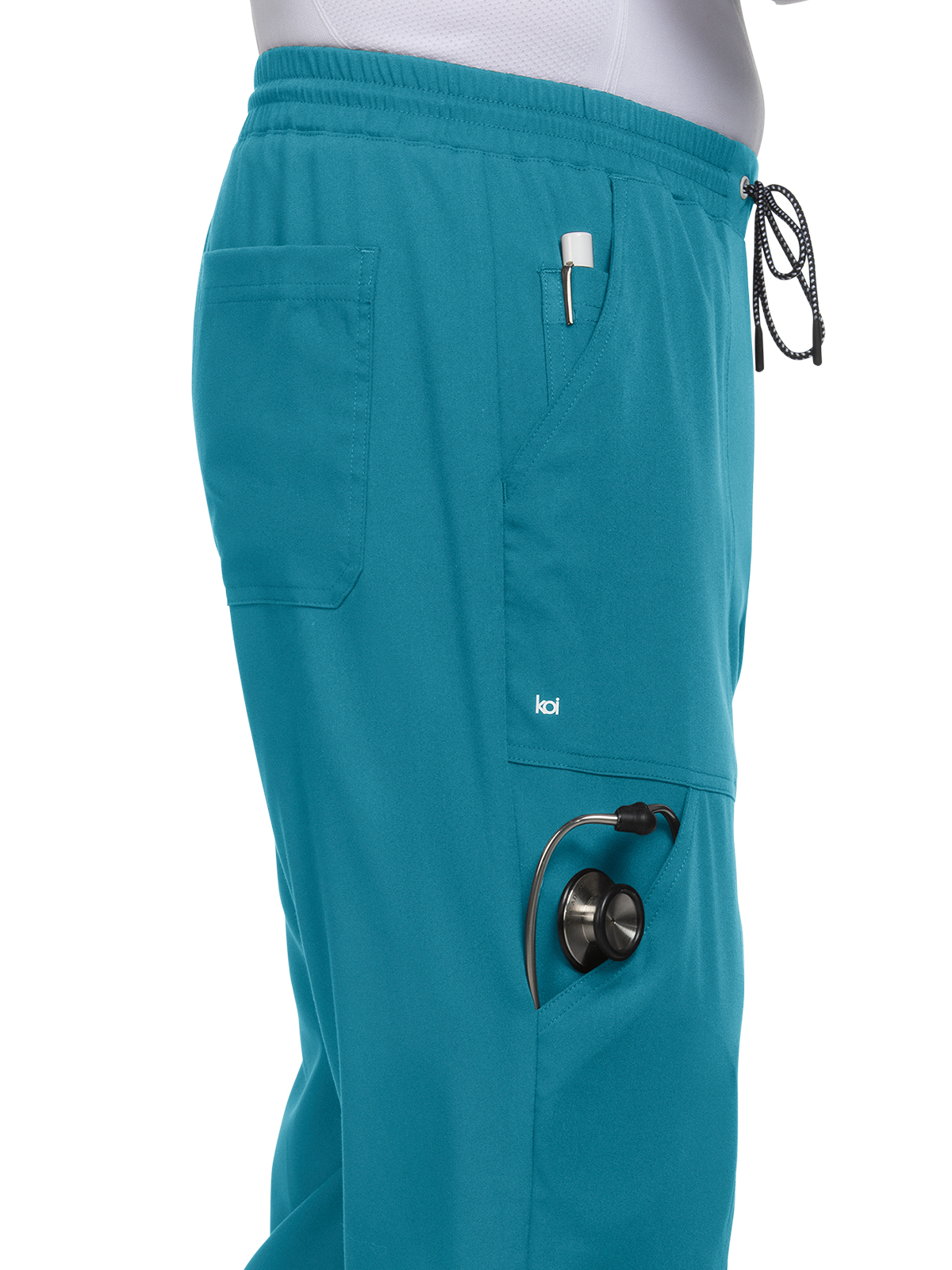 koi - Next Gen - Men's Seven-Pocket Jogger Day to Night Pant 29