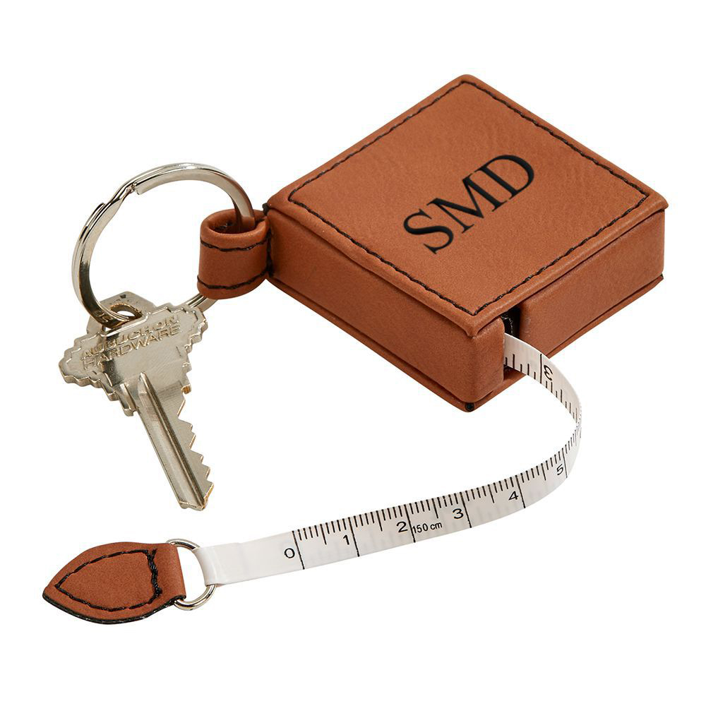 leatherette sq 5" tape measure key chain. 1