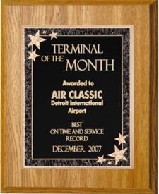 7" x 9" Oak Finish Plaque with a Black Starburst Plate 1