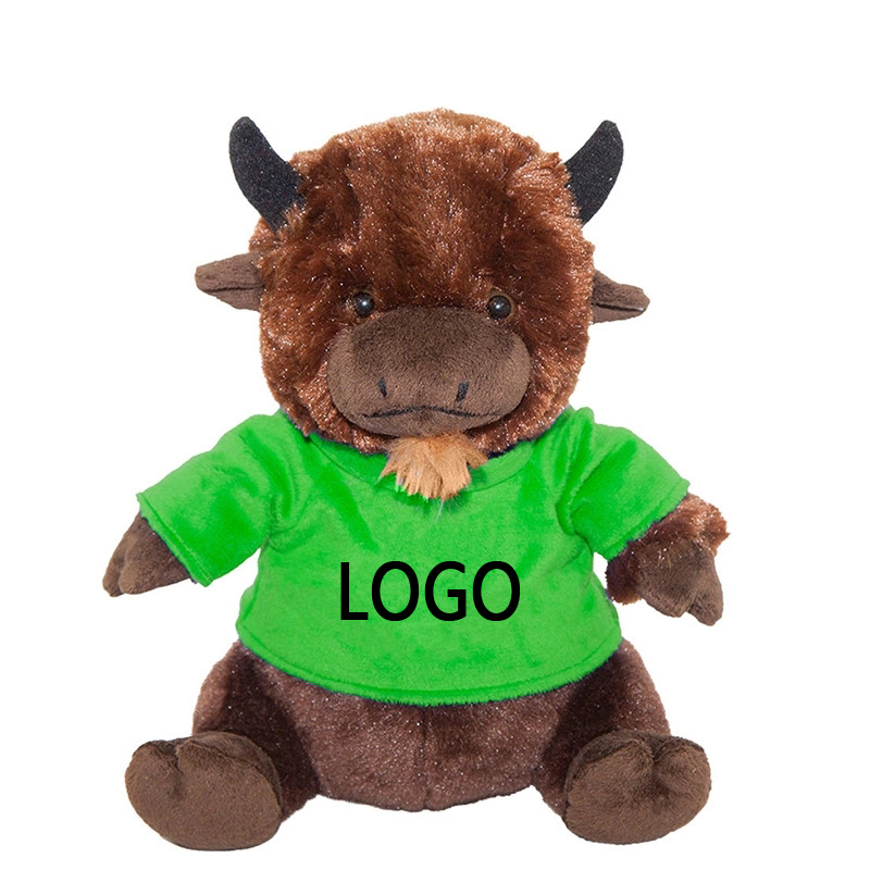 A stuffed cow in a T-shirt 3