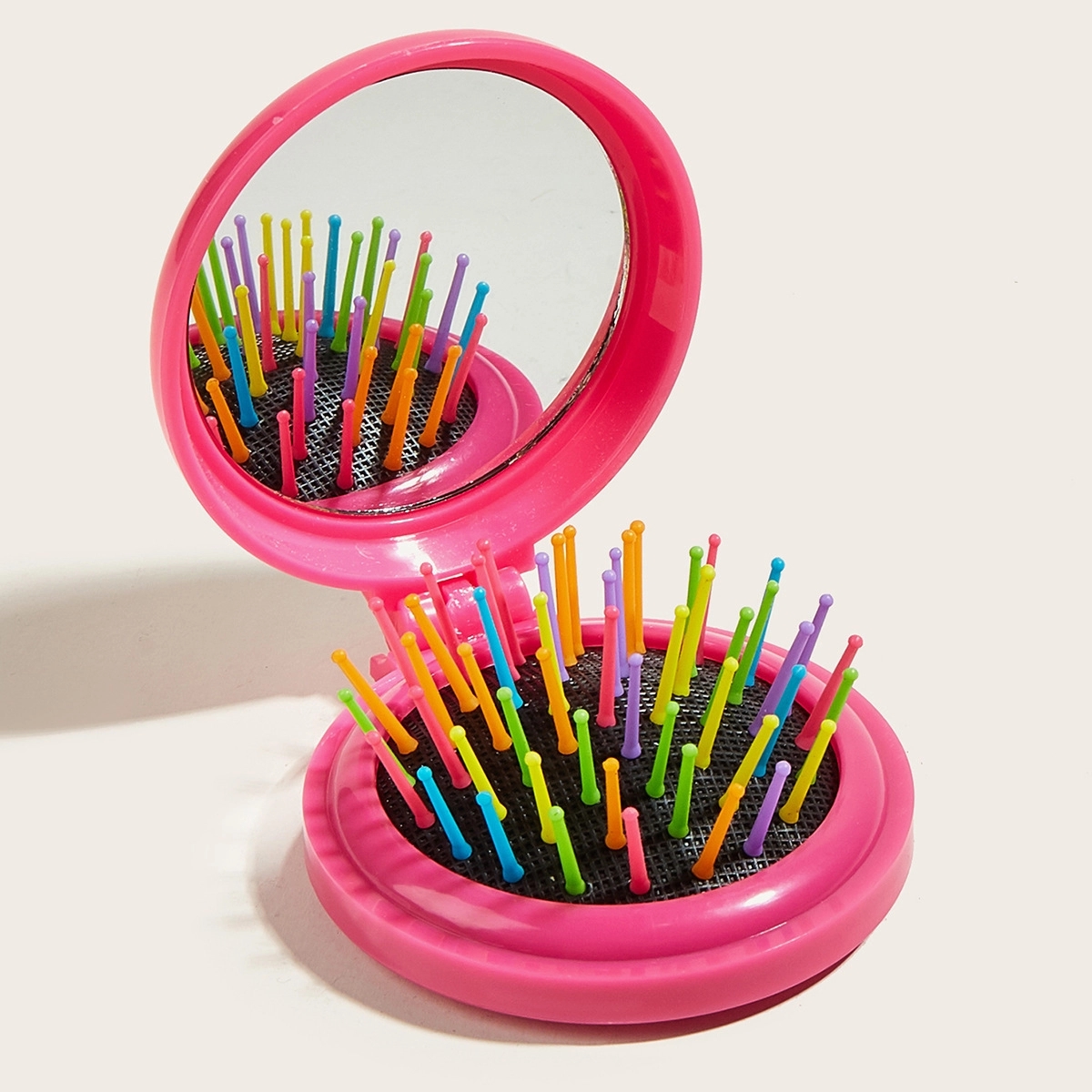 Folding comb mirror 6