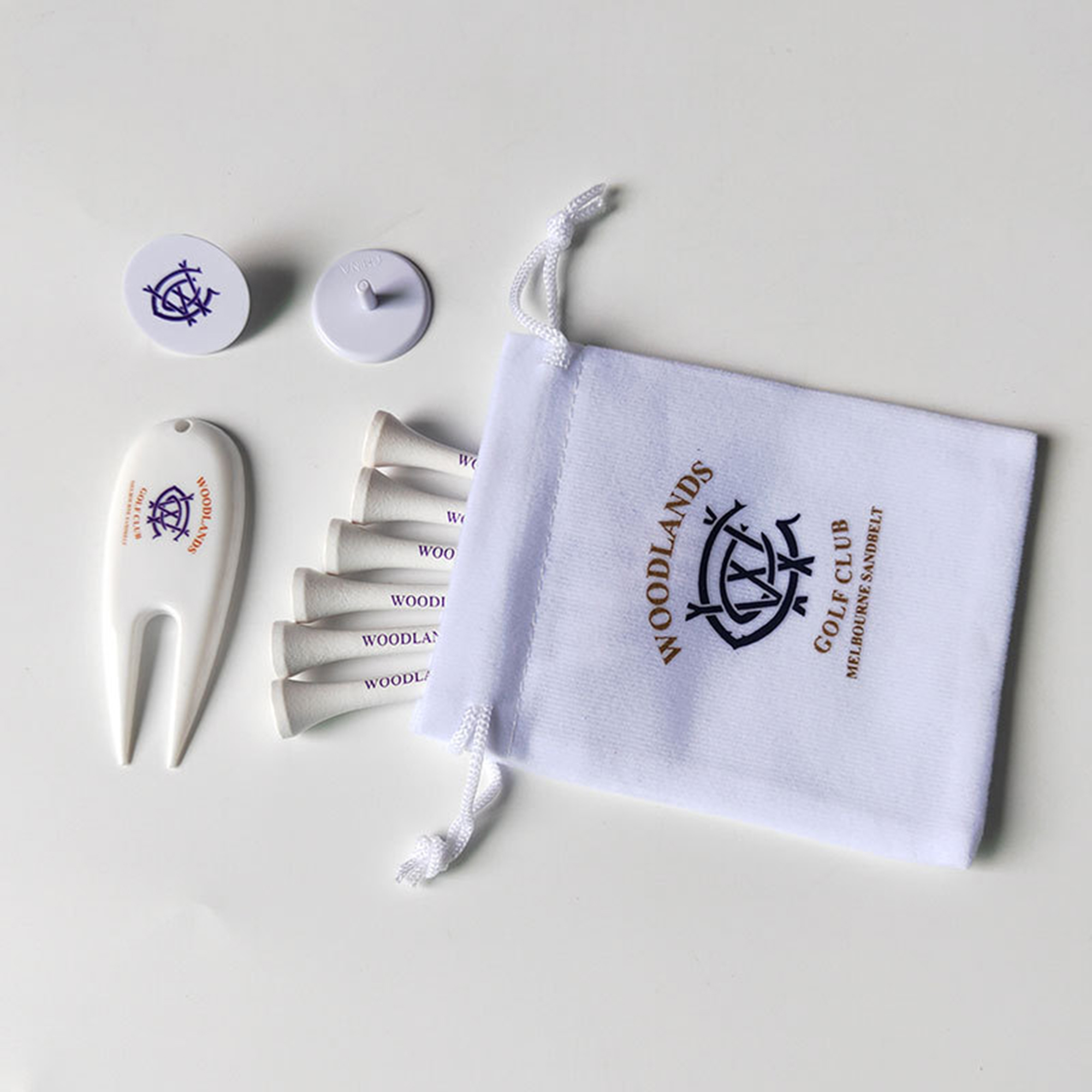 Golf Pack of 6 Tees, 2 Ball Markers, 1 Divot Tool in White Drawstring Bag 3