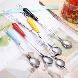 5.74 Inch Ceramic Handle Steel Spoon 23