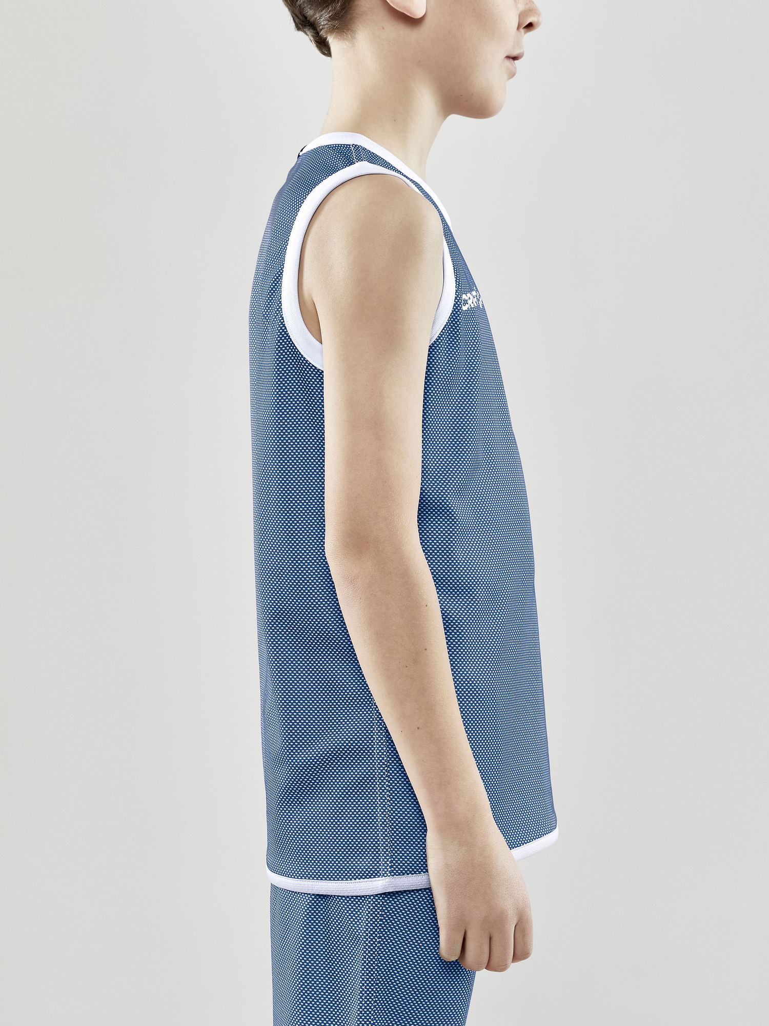 PROGRESS REVERSIBLE BASKET SINGLET JR 18