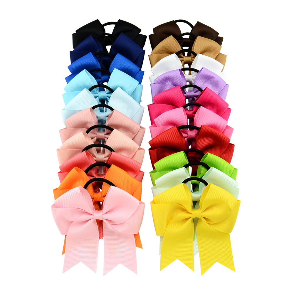 Cheer hair bows are made of ribbon with a sturdy elastic rubber hair band 2