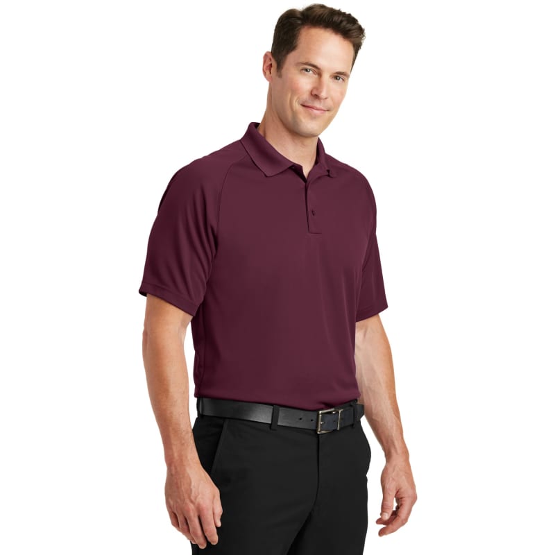 Sport-Tek Dry Zone Raglan Polo. 23
