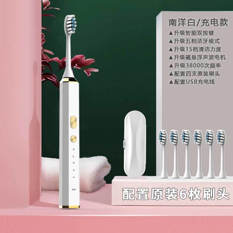 Electric Toothbrush With 4 Replacement Brush Heads 6